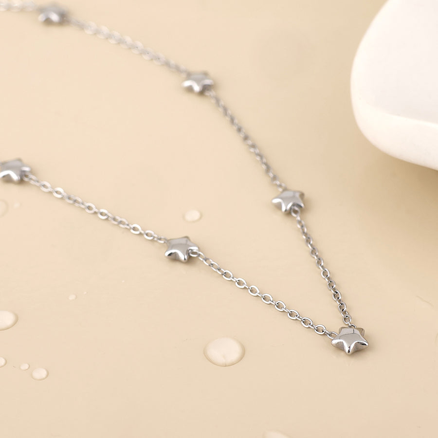Dusty Stainless Steel Platinum Plated Tiny Stars Station Necklace