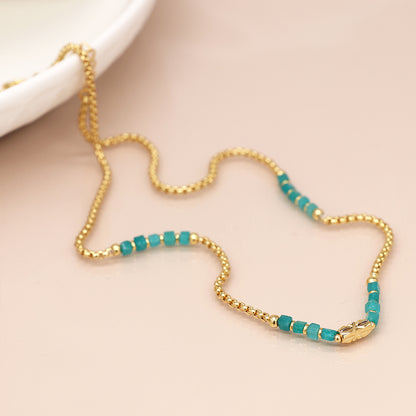 Golden Chain and Aqua Bead Station Necklace