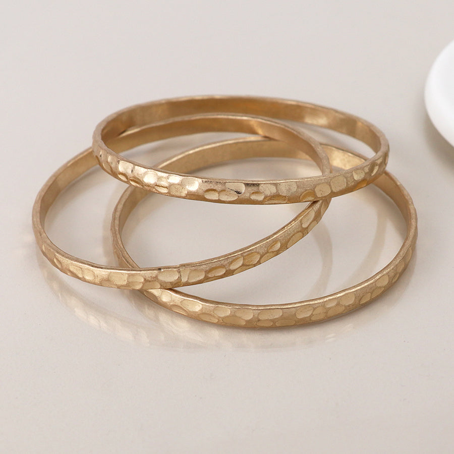 Golden Worn Triple Bangle Set