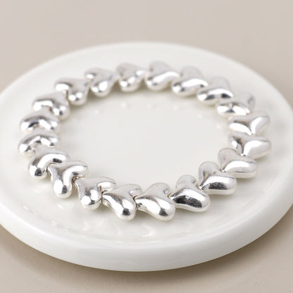 Silver Plated Worn Hearts Stretch Bracelet