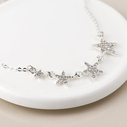 Silver Plated Graduated Crystal Star Necklace