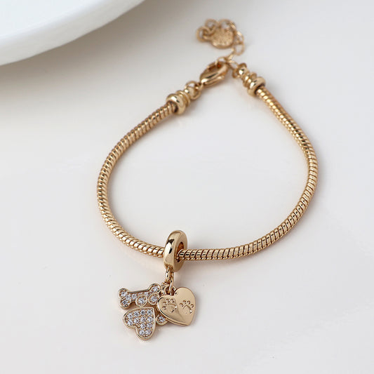 Faux Gold Plated Slider Charm Bracelet with Crystal Heart and Paws Charm