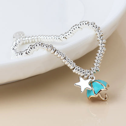Silver Stretch Beaded Bracelet with Star and Umbrella Charms