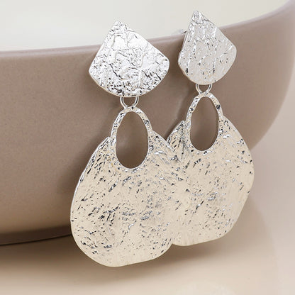 Aegean Silver Plated Worn Foil Finish Teardrop Statement Earrings