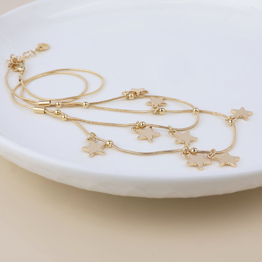 Stardust Golden Double Strand Star Drops Necklace