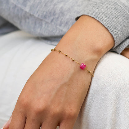 Dotty Stainless Steel Gold Plated Bead Station and Pink Stone Bracelet