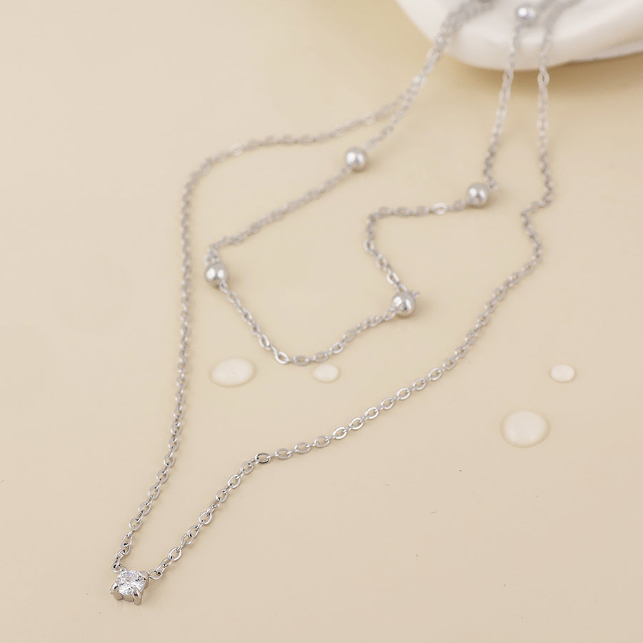Zenith Stainless Steel Platinum Plated Layered Station and Crystal Necklace